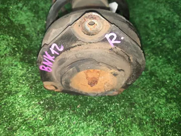 СТОЙКА НА NISSAN MARCH BNK12 CR14DE