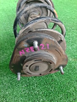 СТОЙКА НА TOYOTA COROLLA RUNX NZE121 1NZ-FE