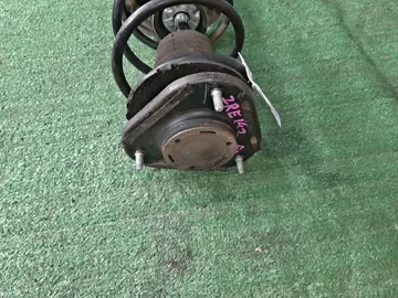 СТОЙКА НА TOYOTA COROLLA  AXIO ZRE142 2ZR-FE